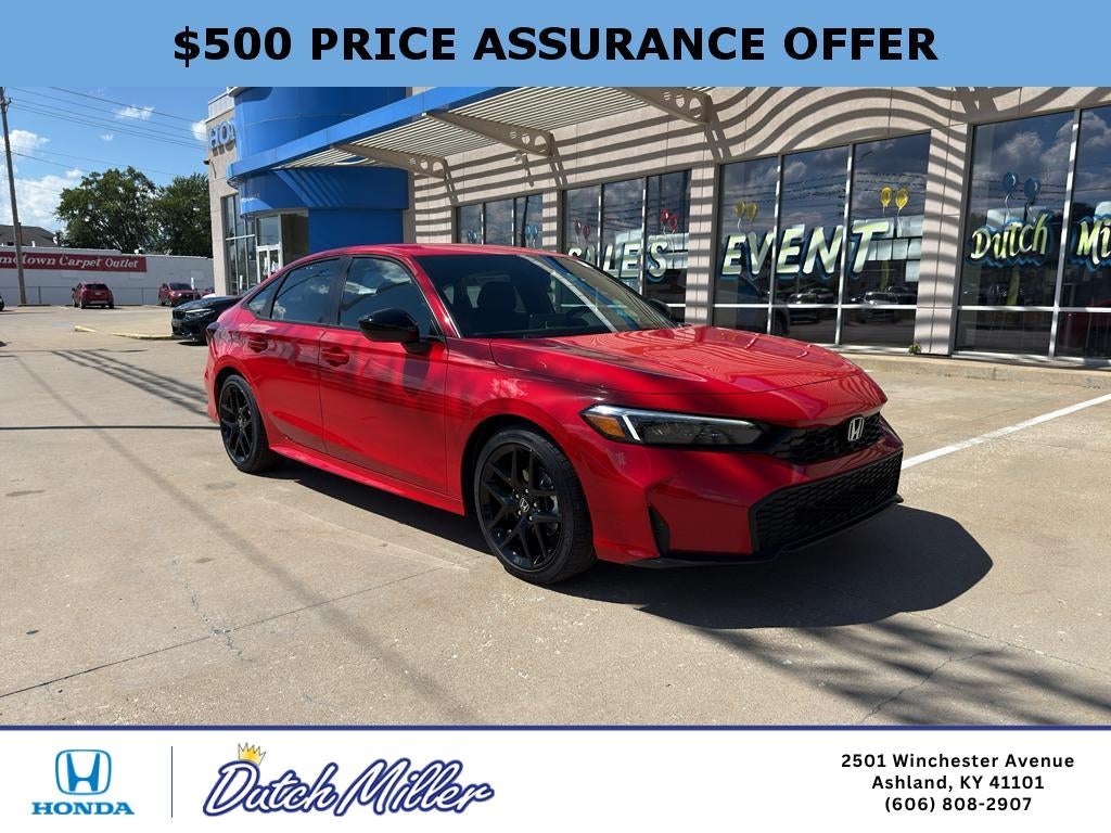 2026 Honda Civic Sport in Rallye Red — front three-quarter view