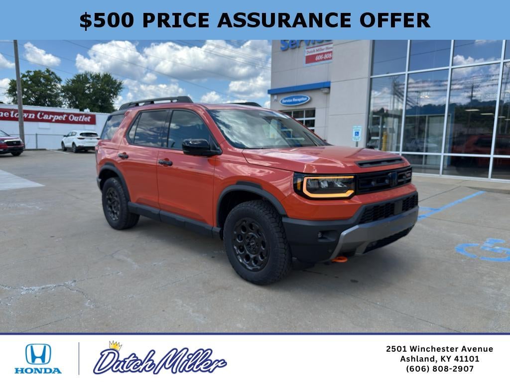 2026 Honda Passport TrailSport Elite Blackout in Sunset Orange — front three-quarter view